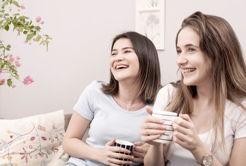 two woman talking at home 