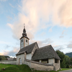Fototapeta premium Old church in the village of Stara Fuzina, Slovenia