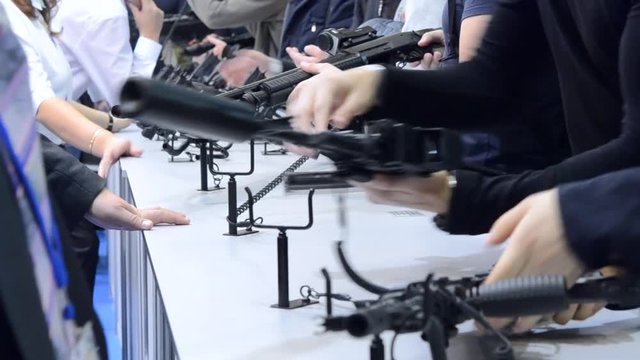 Several large-caliber weapons on the table close-up