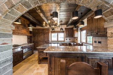 Countertop in stylish wooden kitchen room