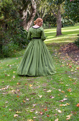 Fototapeta premium Victorian woman in green dress