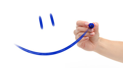 Hand marker draws smiley on white background isolation