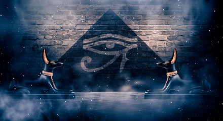 Anubis of Ancient Egypt (God of Death). Dark abstract Egyptian background, dark room with smoke, pyramid, rays of light. - obrazy, fototapety, plakaty