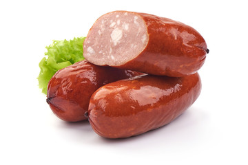Oktoberfest Grilled Sausages with lettuce. Isolated on a white background. Close-up