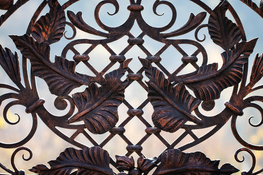 wrought-iron gates, ornamental forging, forged elements close-up