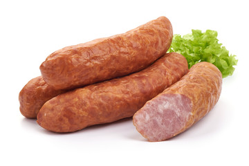 Hunting Smoked Sausages with lettuce, Close-up, isolated on a white background.