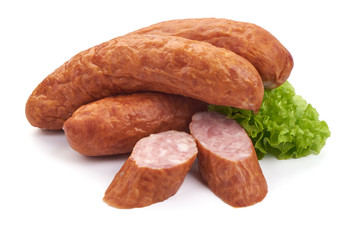 German specialty salami. Hard cured sausage with lettuce, Close-up, isolated on a white background.