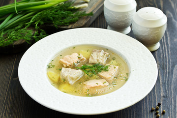 fish soup with ingredients and spices for cooking.