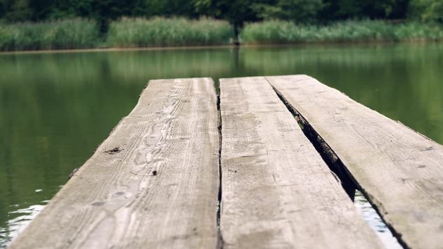 a boat dock on a small lake