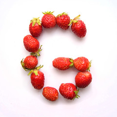 Letter G of the English alphabet from strawberry