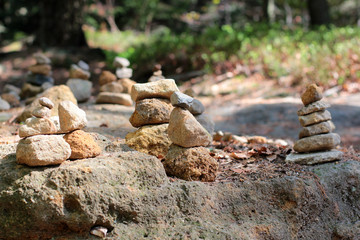 Pyramids and people of stones in the reserve Hrensko, Czech Republic. Trolls and chedo. Czech Switzerland. Bohemia. Pravcicka gate. Pravcicka brana