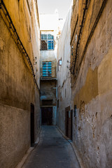 Old narrow street of the largest medina in the worlds, Unesco, Fez, Morocco in Africa