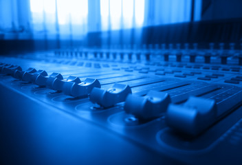 Studio mixer audio interface bokeh background