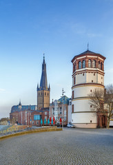 Fototapeta na wymiar Old Castle Tower and st Lambertus church, Dusseldorf, Germany