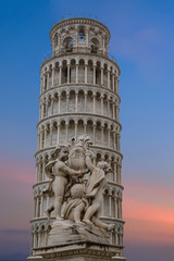 Fototapeta na wymiar Statue and Leaning Tower