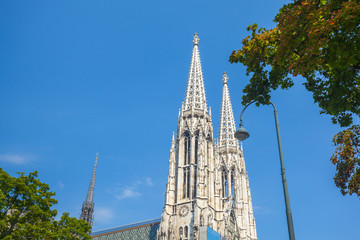Fototapeta na wymiar The Votive Church (Votivkirche) located on the Ringstrasse in Vienna, Austria