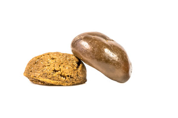 Colored pepernoten treats on white background