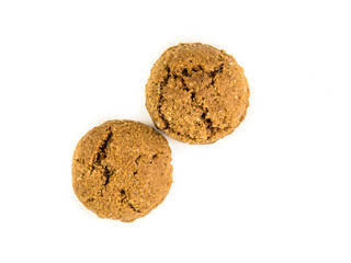 Two pepernoten treats top view on white background
