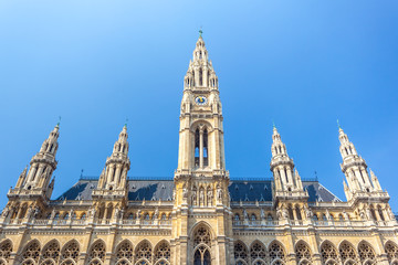 Fototapeta na wymiar Tall gothic building of Vienna city hall