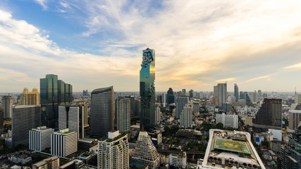 Naklejka na ściany i meble beautiful sunset of the Metropolitan Bangkok City downtown cityscape urban skyline - Cityscape Bangkok city Thailand