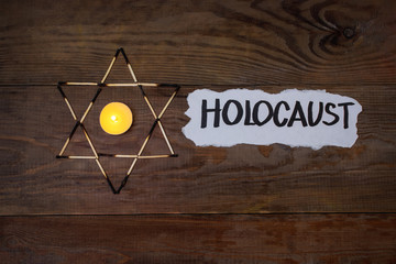 Holocaust Remembrance Day. Star of David made of matches.