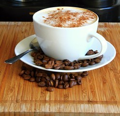 image of a cup of coffee  on the table stock photo