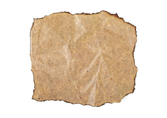 Old crushed paper with the burned edges, white background.