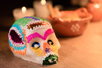 Sugar skull and light candles - Calaverita de azucar Dia de muertos