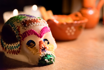 Sugar skull and light candles - Calaverita de azucar Dia de muertos