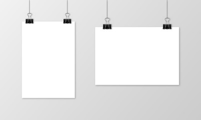 Empty A4 sized vector paper frame mockup hanging with paper clip - stock vector.