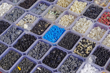 Plastic parts in trays