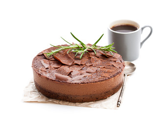 Baked belgian chocolate cheesecake with rosemary topped with chocolate ganache