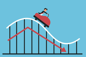 Man riding decreasing chart on blue