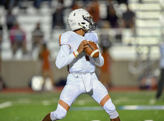 High School Football player in action during a game in South Texas