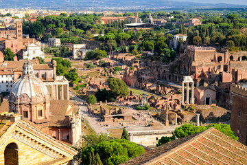 Fototapeta premium Beautiful view of the archaeological zone in picturesque Roman ruins, Ruins of Ancient Rome.