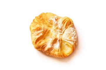 Fresh bakery flat lay photo. Crispy bun puff pastry top view on white background