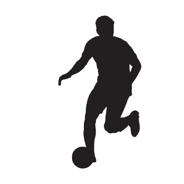 Football player running with ball, front view. Isolated vector silhouette. Soccer player