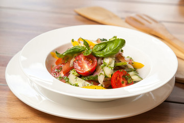 Fresh vegetable salad with greens