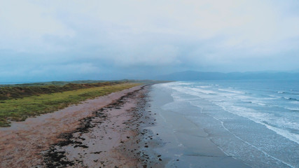 Aerial view over Inch beach at Dingle Peninsula in the evening