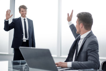 Fototapeta premium businessman greets colleague