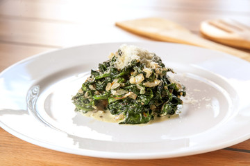 Spinach stewed with cheese