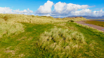 Low Aerial view over the dunes at the west coast of Ireland