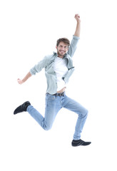 Happy man jumping in air over white background