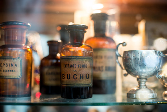 Small glass brown bottles in a potion shop in San Telmo Market, Buenos Aires, Argentina