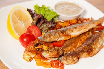 Fried fish with vegetables
