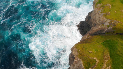 Flight along the steep cliffs of the Irish west coast - obrazy, fototapety, plakaty