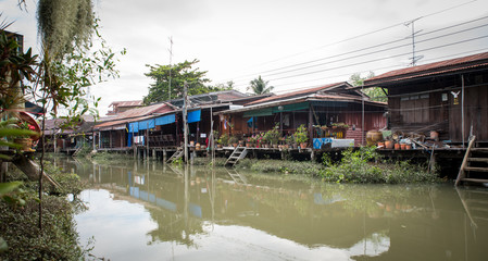 Houses on canal in Thailand