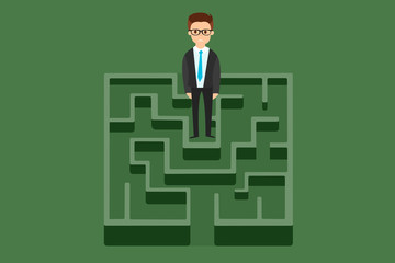 Businessman standing in labyrinth