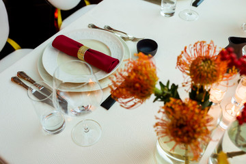 napkin in a ring on a plate in a restaurant on a served table