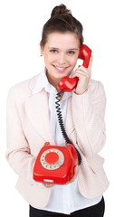 Woman Talking on Corded Phone - Isolated on White
